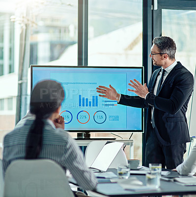 Buy stock photo Cropped shot of a businessman delivering a presentation in the boardroom