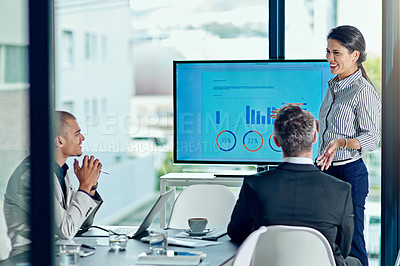 Buy stock photo Cropped shot of a businessperson delivering a presentation in the boardroom