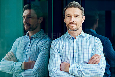 Buy stock photo Portrait of a successful businessman at work