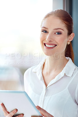 Buy stock photo Portrait, smile and tablet with business woman at window in office for email, planning or research. Face, internet and technology with happy young employee in workplace for information administration