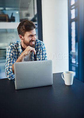 Buy stock photo Cropped shot of young a designer working on a laptop in a modern office