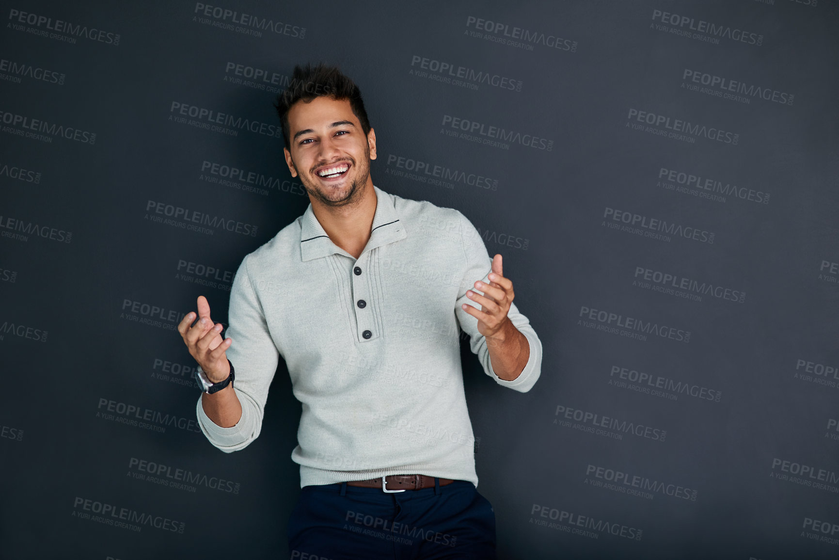 Buy stock photo Portrait, laugh and man in studio, fashion and smile with laughing, confidence and proud of outfit. Dark background, stylish and person in jeans, denim and publicist for news or business and job