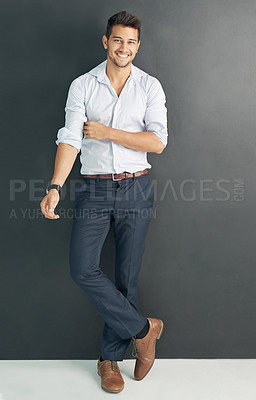 Buy stock photo Studio shot of a relaxed young businessman