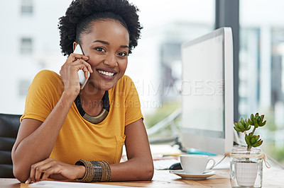 Buy stock photo Cropped portrait of a young designer talking on her cellphone in her office
