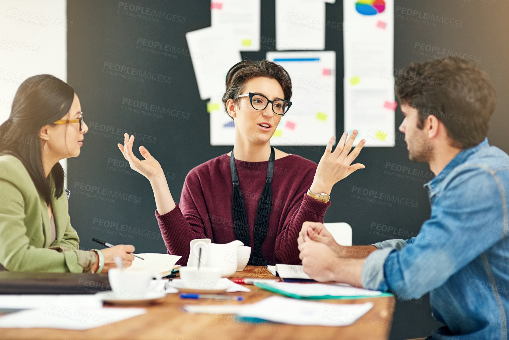 Buy stock photo People, teamwork or writers talking in startup meeting for writing solution, conversation or discussion. Paperwork, woman and editors in office for planning, creative ideas or group collaboration