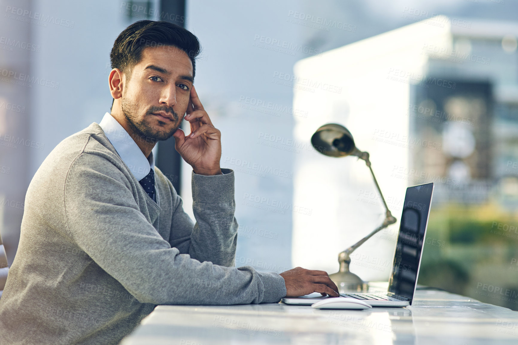 Buy stock photo Businessman, working or desk in office with laptop for law, research for court case or agreement. Male lawyer or table at workplace with computer for email, review for client with dispute in contract