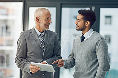 Buy stock photo Mature, man and male person for mentor, tablet and pointing in office for advice in business. Senior, employee and intern on technology in meeting for brainstorming, ideas and vision in corporate
