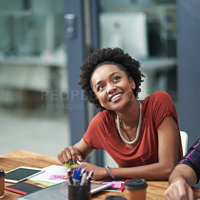 Buy stock photo Cropped shot of a creative businesswoman looking happy at a meeting