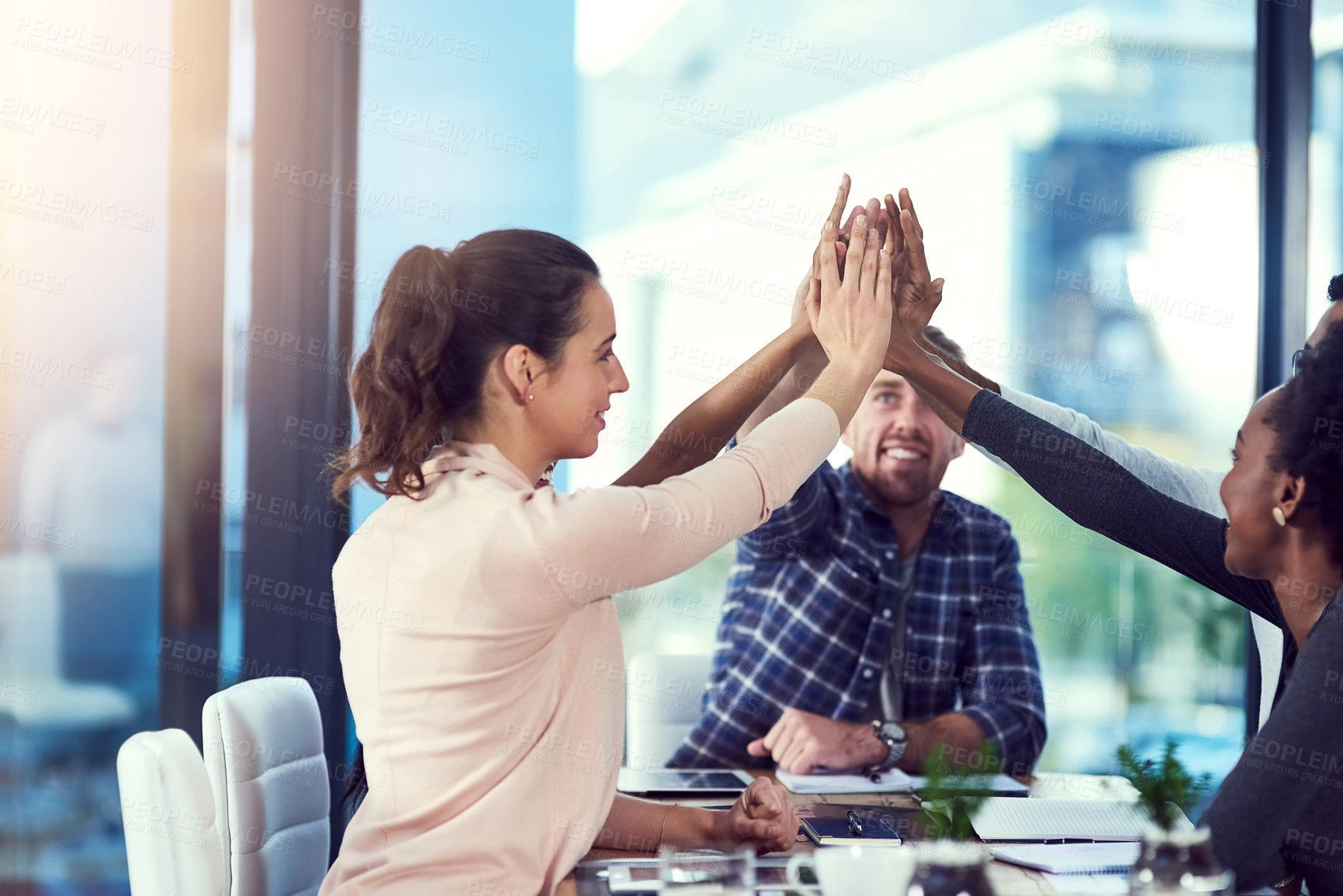 Buy stock photo Startup, success or business people high five in meeting for celebration of goals, target or teamwork. Partnership, smile or excited designers in office for motivation, solidarity or winning deal