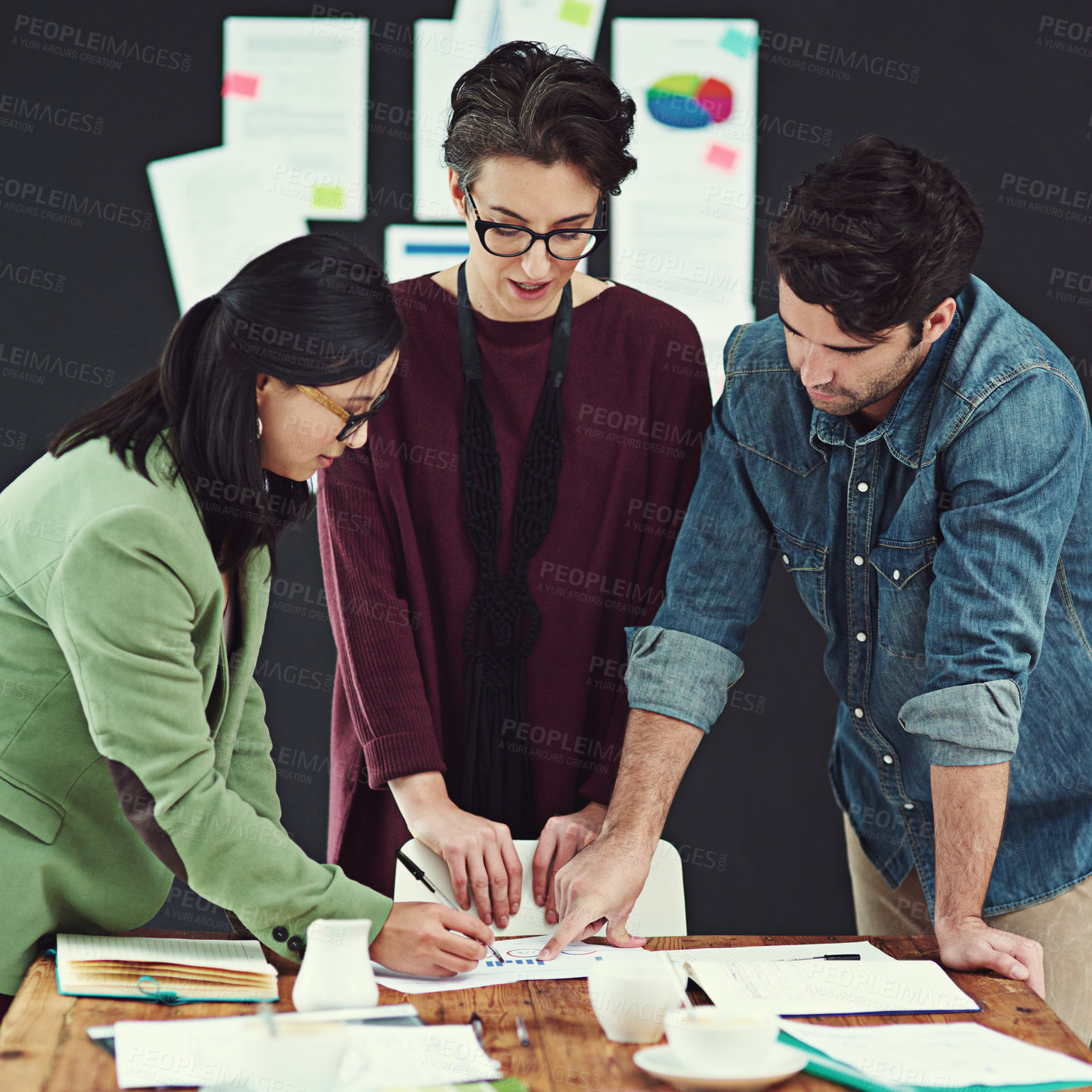 Buy stock photo Writing, paperwork and people in startup meeting for brainstorming, review and collaboration. Notes, support or designer with teamwork, business and planning in conversation for project report