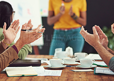 Buy stock photo Closeup shot of businesspeople applauding together in an office