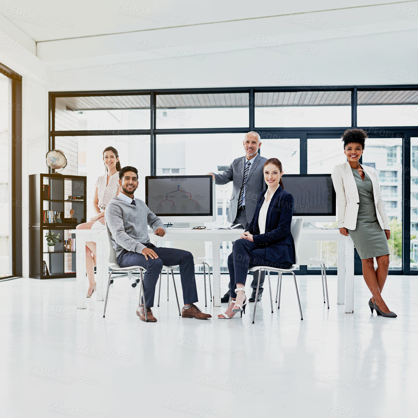 Buy stock photo Portrait of a group of businesspeople standing together