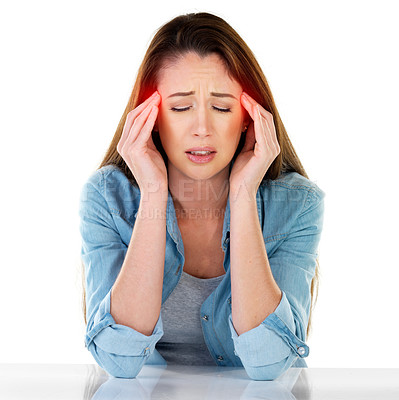 Buy stock photo Studio shot of a young woman experiencing a headache against a white background
