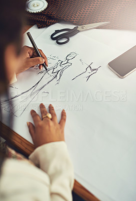 Buy stock photo Cropped shot of a fashion designer working on a new design