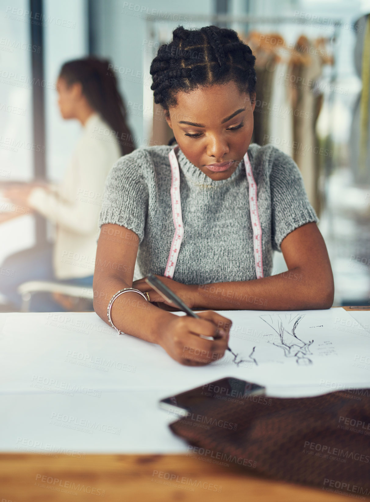 Buy stock photo Shot of a successful young fashion designer