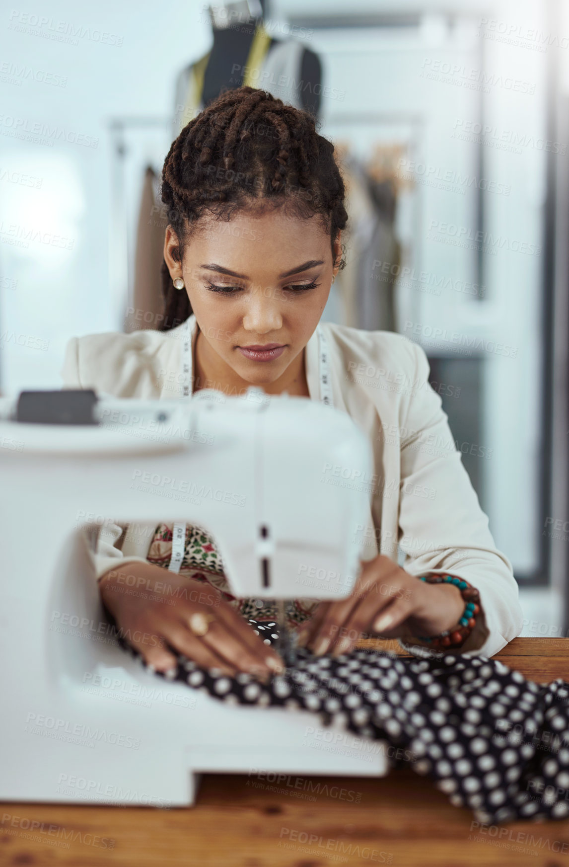 Buy stock photo Woman, fashion designer and garment with sewing machine for clothing production or manufacturing at workshop. Female person, seamstress or dressmaker with linen, fabric or material for handmade craft
