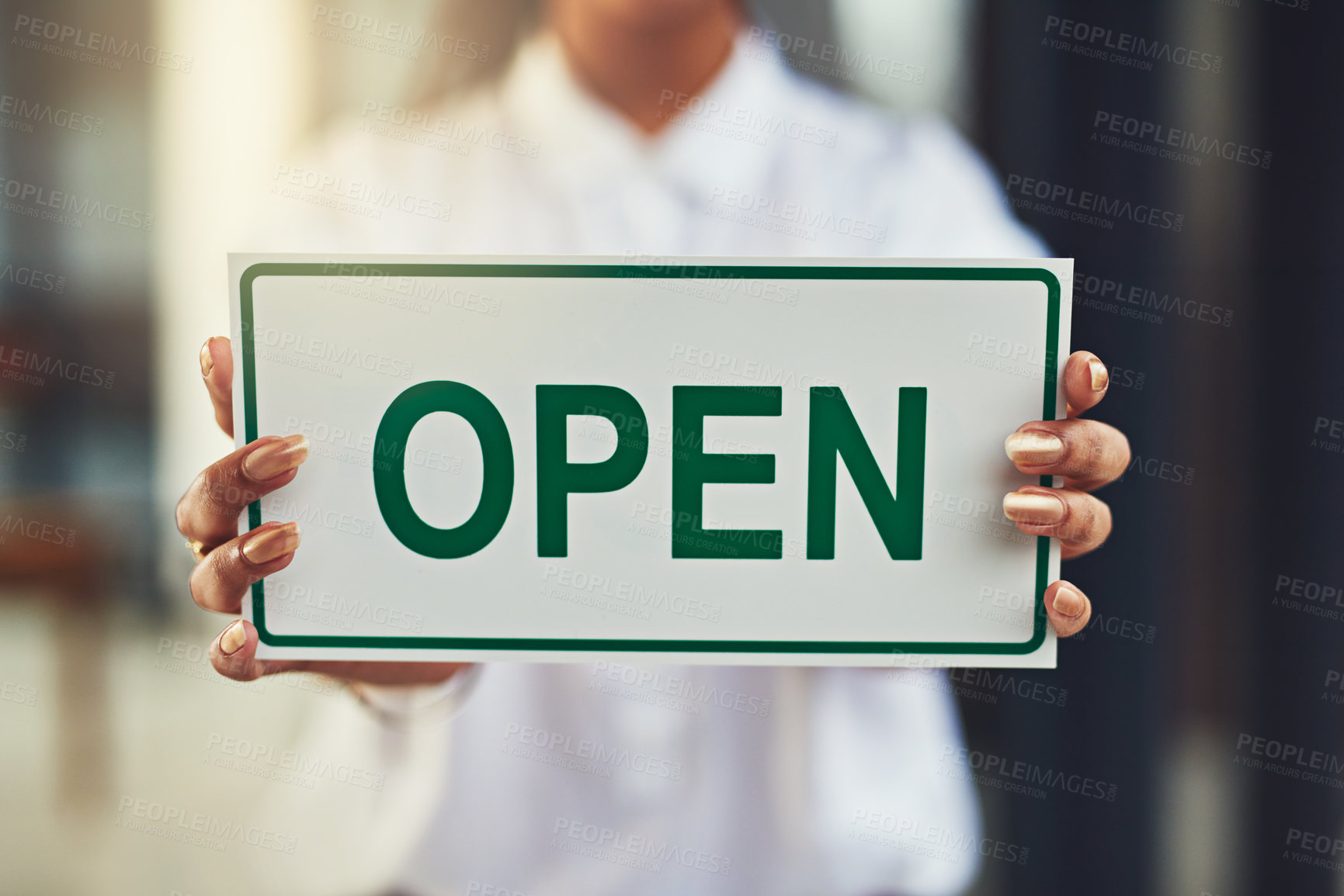 Buy stock photo Owner, woman and hands with open sign at store for welcome, ready for service or small business. Entrepreneur, poster board or start day at entrance in startup retail shop with message or information