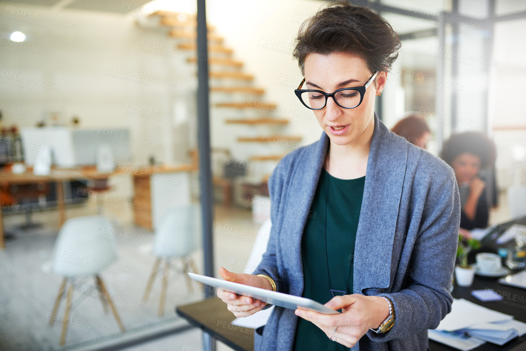 Buy stock photo Business, woman and digital tablet in boardroom for creative research, schedule check or planning. Entrepreneur, employee and reading online article for project, communication or web search in office