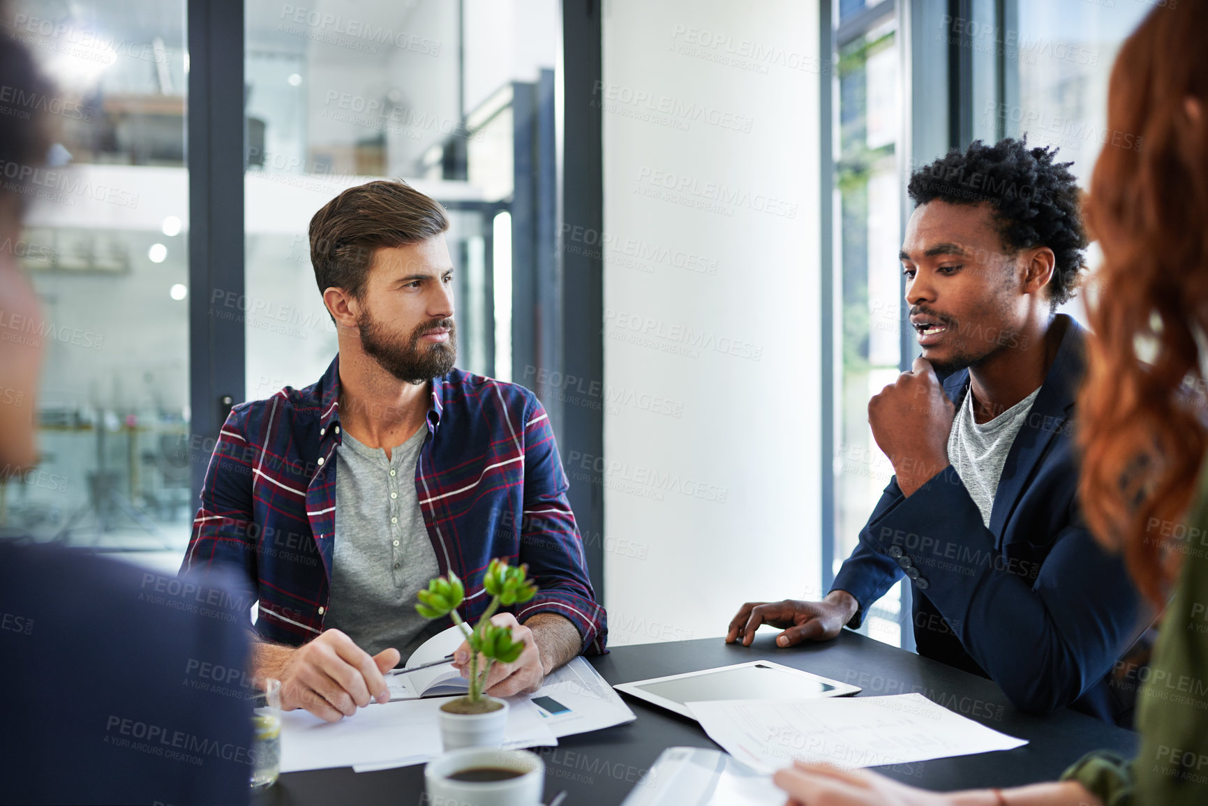 Buy stock photo Team, brainstorming or people in meeting in office, workspace or conference room with notebook for agenda. Discussion, partnership or employees together for plan, work or diversity in creative career