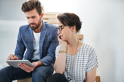 Buy stock photo Colleagues, office and tablet for creativity, together and connect for company, business or startup. Female person, man and technology in workplace on stairs for communication, ideas and vision
