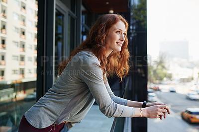 Buy stock photo Happy, businesswoman and thinking outside looking at city on balcony  with vision for company project. Female employee, smile and ideas in portrait for inspiration or innovation on startup proposal 