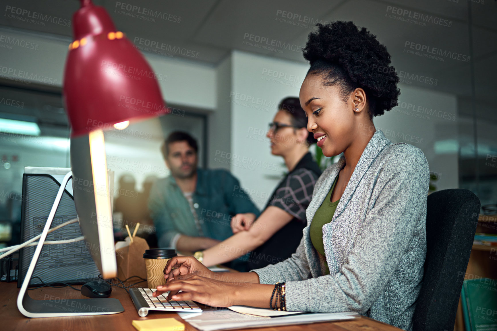 Buy stock photo Smile, computer and black woman typing in office for creative research with project online. Happy, technology and African female copywriting editor working on web design on desktop in workplace.