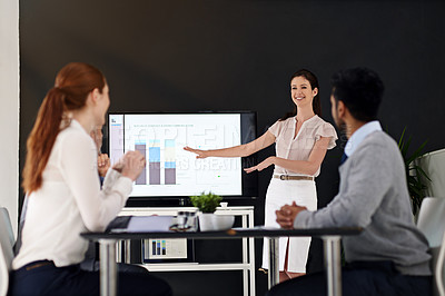 Buy stock photo Business people, woman and discussion in presentation for data analytics with graph and financial growth of company. Collaboration, team and happy in meeting with stats report and feedback on charts