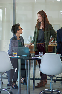 Buy stock photo Business people, startup or talking for planning in meeting for brainstorming, research or strategy on laptop. Women, partnership or designers speaking of teamwork, collaboration or creative ideas