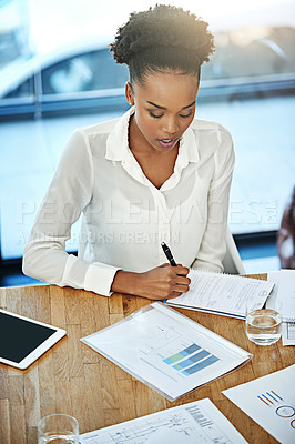 Buy stock photo Cropped shot of a young businesswoman in her office