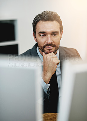 Buy stock photo Business man, computer and thinking in office for information technology, software or online programming. Programmer or web developer reading on his desktop for idea, research or coding solution