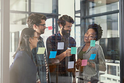 Buy stock photo Shot of creative businesspeople  having a brainstorming session