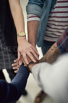 Buy stock photo Hands together, teamwork and top view of business people with success, partnership or celebrate goal in creative startup. Above, huddle and group of employees with support for community of designers