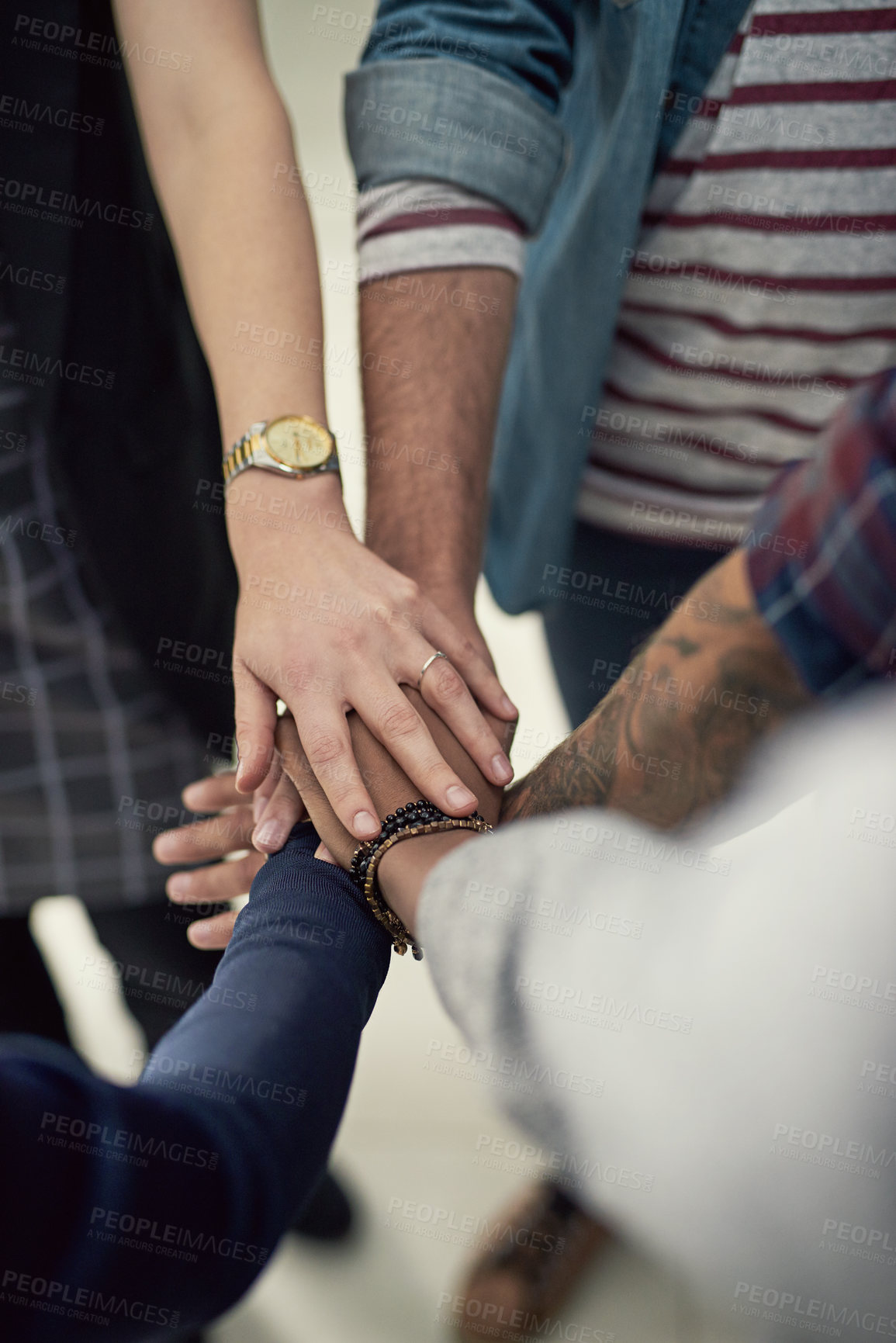 Buy stock photo Hands together, teamwork and top view of business people with success, partnership or celebrate goal in creative startup. Above, huddle and group of employees with support for community of designers