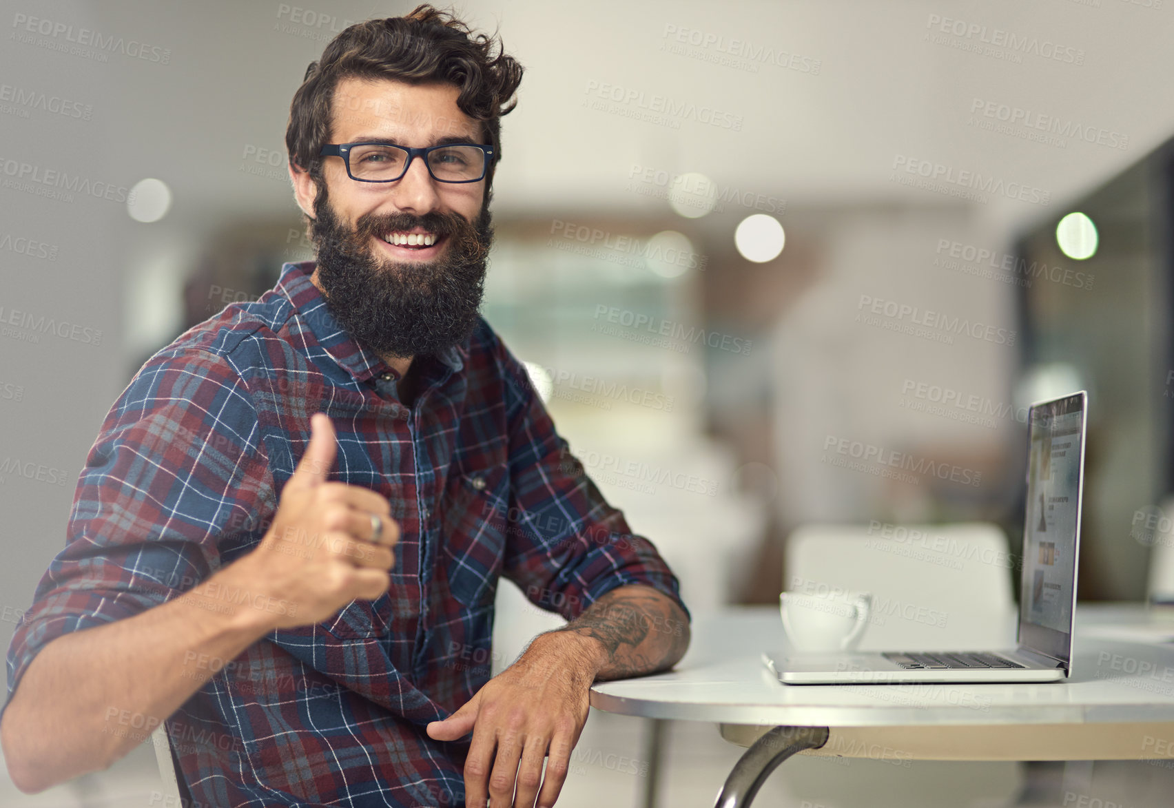 Buy stock photo Man, thumbs up and laptop in creative workspace for online company, programming and coding for tech. Web design, developer and happiness in office for success, internet and yes for agreement