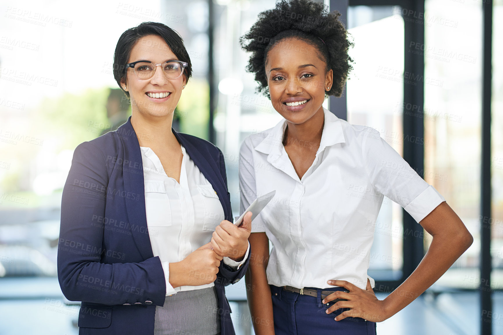 Buy stock photo Cropped portrait of two businesswomen standing outside the boardroom before their presentation
