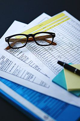 Buy stock photo Paperwork, documents and checklist information or review of ecommerce production, sales or distribution. Glasses, pile and clothing business for boutique store or stock inventory, planning or report