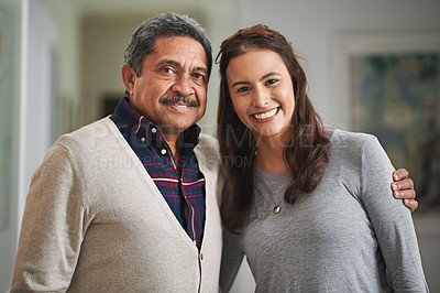 Buy stock photo Cropped portrait of a young woman and her mature father at home