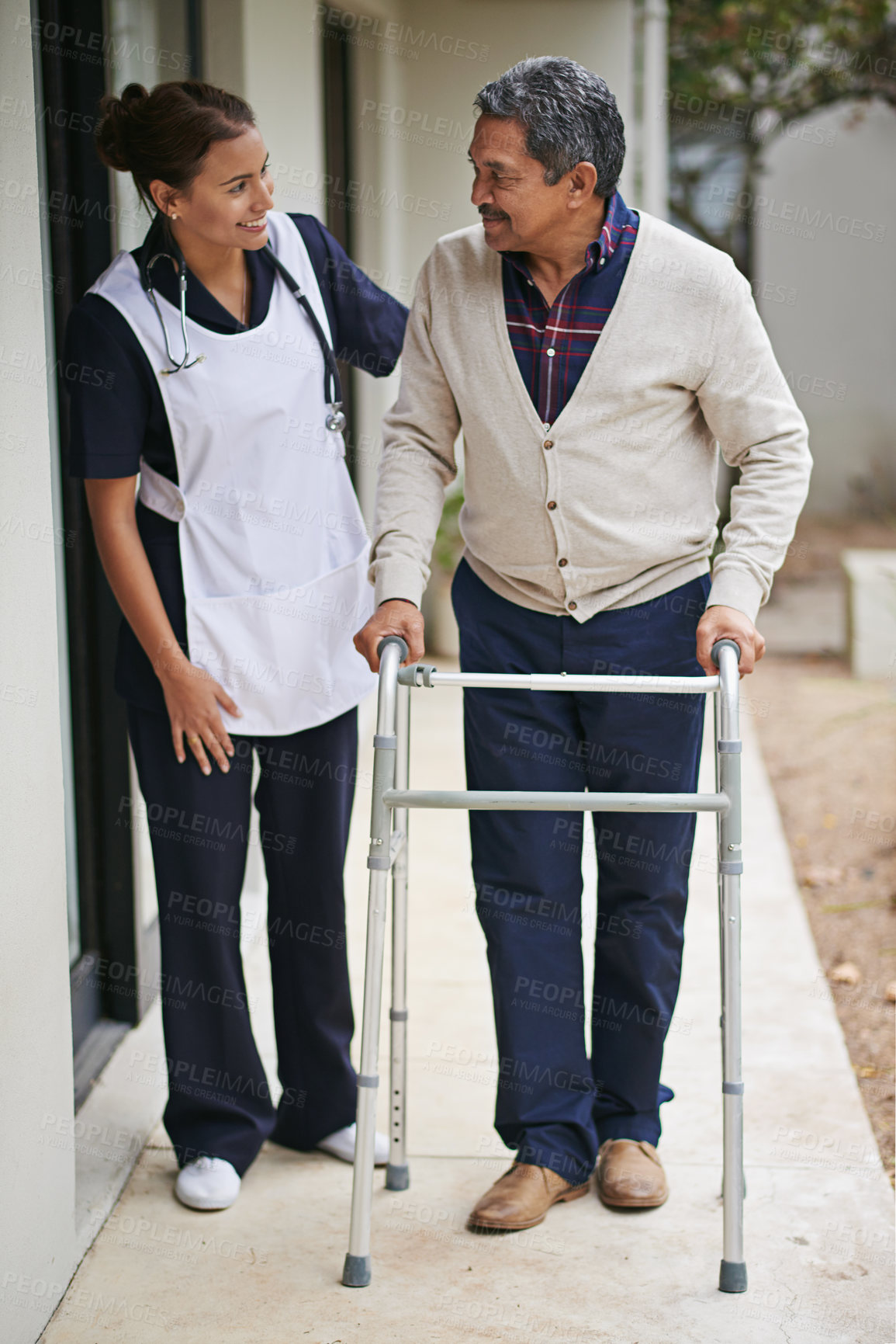 Buy stock photo Senior man, nurse and walking frame outdoor at nursing home for help, healthcare and care with guidance. Elderly person, caregiver and zimmer at retirement house for support, wellness and compassion
