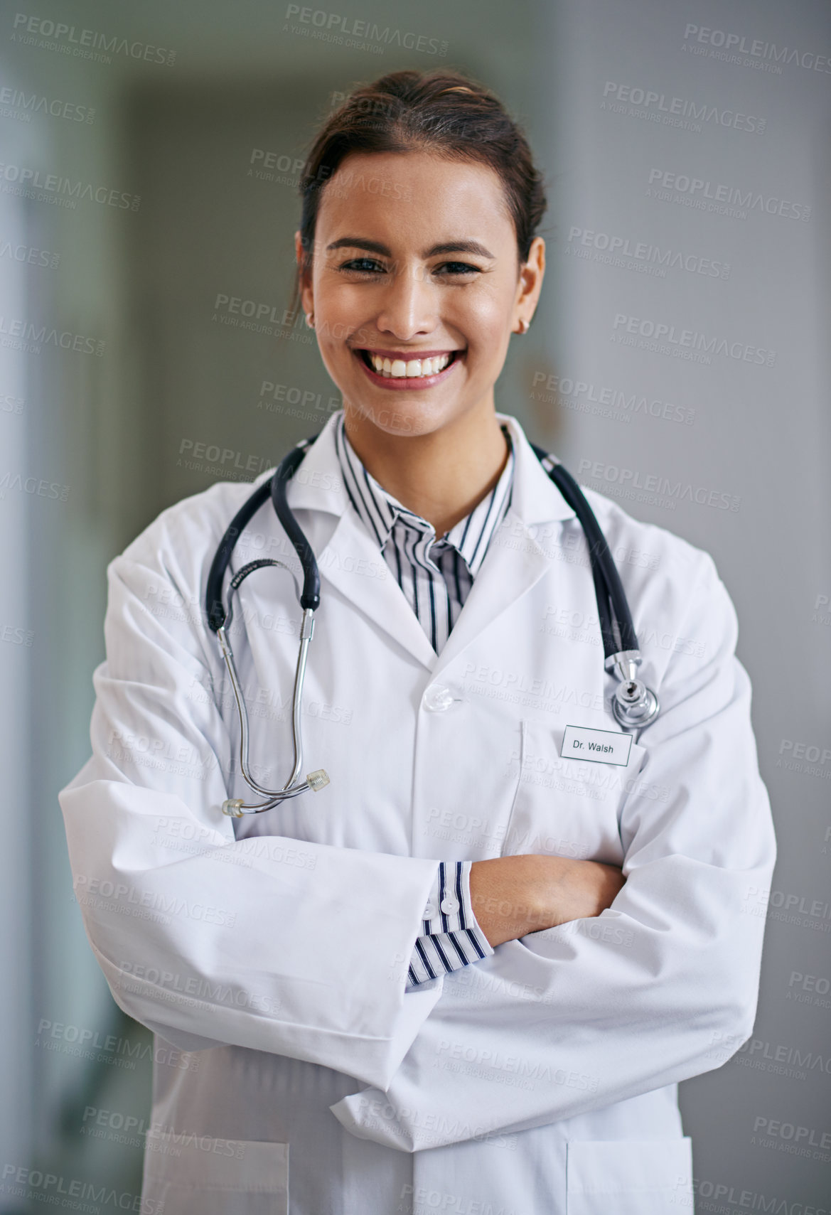 Buy stock photo Woman, doctor with arms crossed with smile in portrait with medical for healthcare in hospital with confidence. Female person, medic and stethoscope for lungs, heart and cardiology for wellness