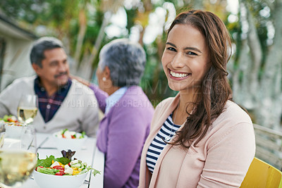 Buy stock photo Family, table and lunch outside in portrait with smile with talking for bonding with food. Daughter, mother and father with visit with dinner for eating in outdoors with chat, hungry and happiness