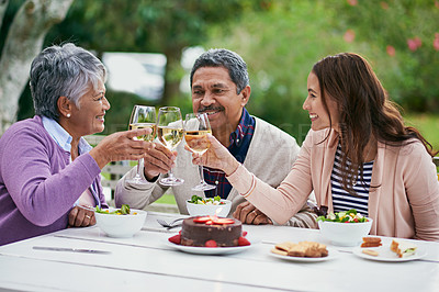 Buy stock photo Senior, couple and daughter, outdoor and wine for celebration of anniversary of parents with food. Summer, relax and healthy diet, cake and lunch for brunch in backyard or garden, woman and family
