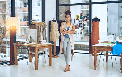 Buy stock photo Portrait of a young fashion designer posing with her arms crossed in her workshop