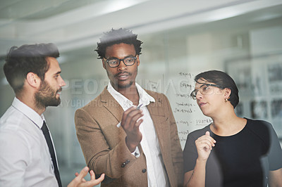 Buy stock photo Business people, glass wall and writing with discussion, ideas or planning with teamwork in office. Cooperation, professional or employees with partnership or collaboration or creative for startup