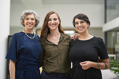 Buy stock photo Cropped portrait of three businesswomen standing together in their office