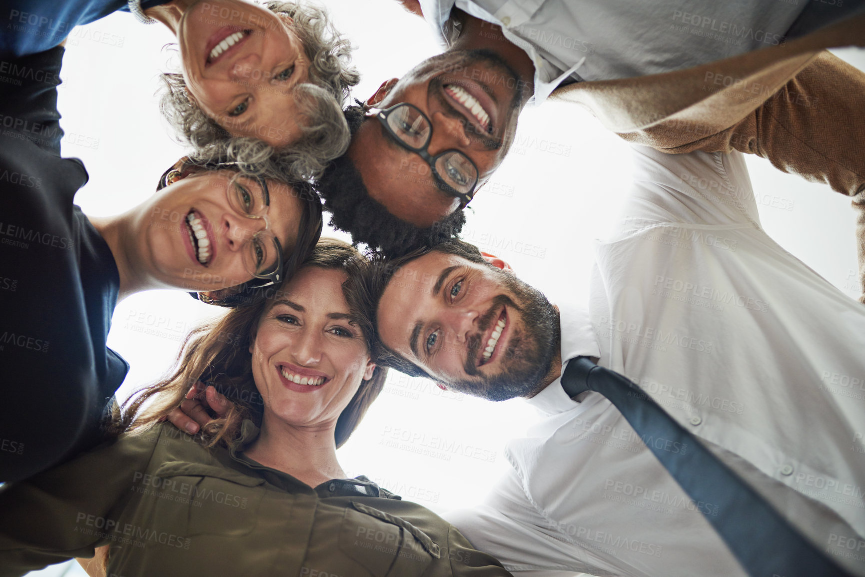 Buy stock photo Business people, face and huddle with smile together for company support, trust and team building. Happy, group circle and partnership for corporate mission, target and goal with collaboration