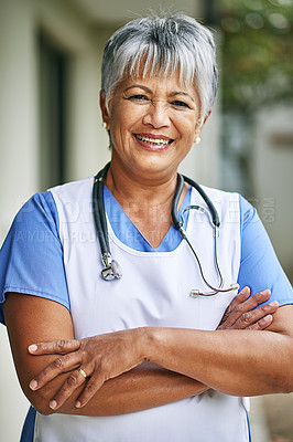 Buy stock photo Portrait, woman and senior nurse with pride outdoor for healthcare, hospice and sick. Medical care, stethoscope and face of mature female worker at clinic for helping elderly, smile and confidence