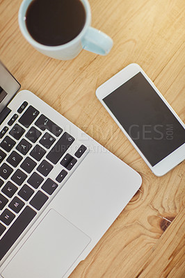 Buy stock photo Business, office and laptop with smartphone above for creative ideas, research and planning from technology for start up company. Wireless, pc and coffee for energy to review information on computer