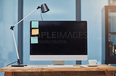 Buy stock photo Still life shot of a computer at a workstation in an office
