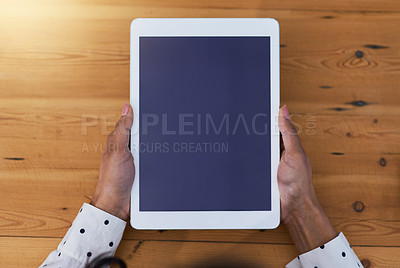 Buy stock photo High angle shot of a businesswoman holding a digital tablet