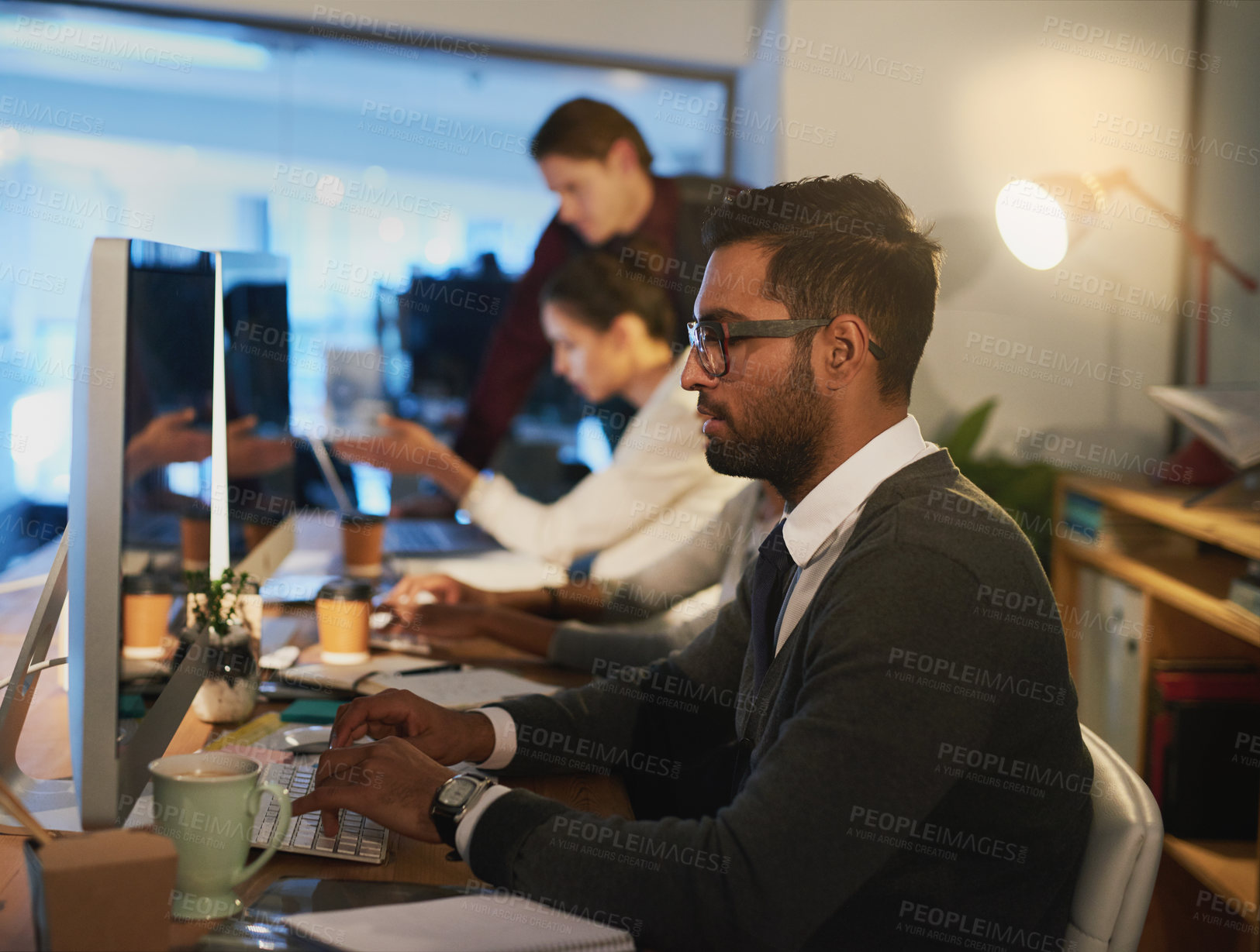 Buy stock photo Business man, programmer and computer at night in office, online and software or web design. Male person, coworking space and typing code for deadline, cybersecurity and app developer in profile